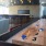 Game room with seating and suffleboard 