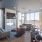 Large lounge area with a large tv and plenty of seating