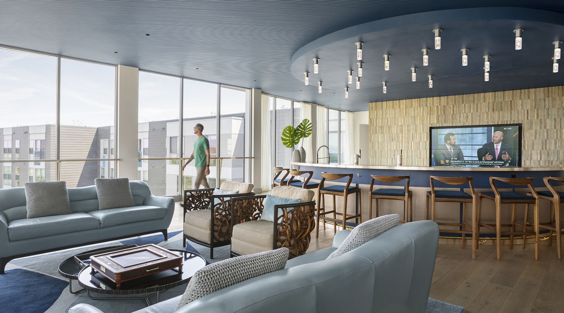 Large rooftop lounge with bar seating